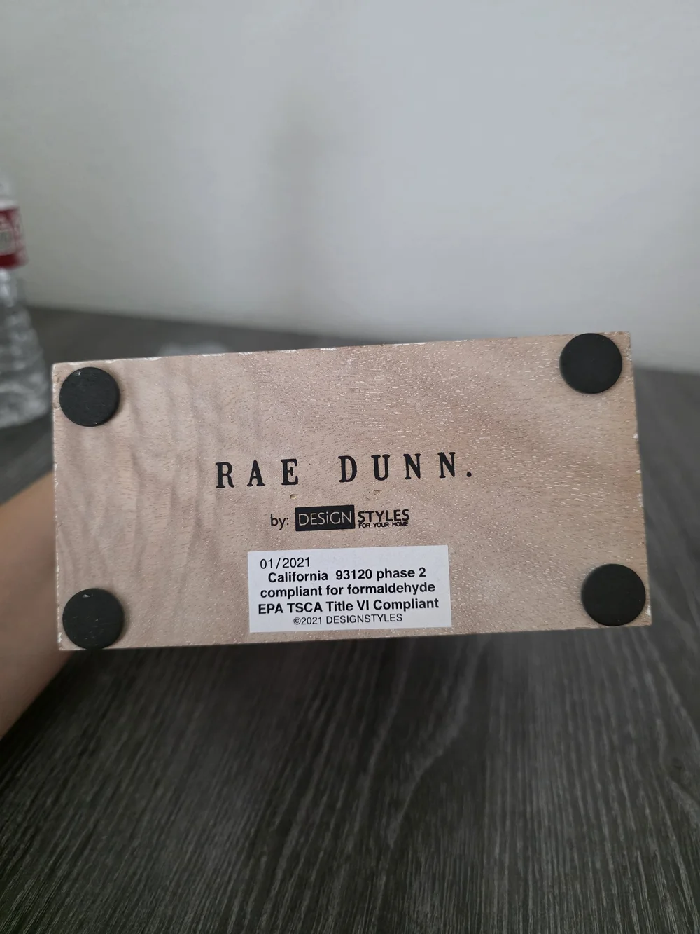 Rae Dunn Rose Gold Plaque with Black Feet